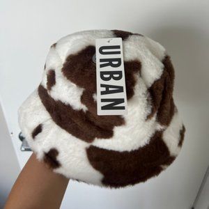 UO cow print faux fur hat